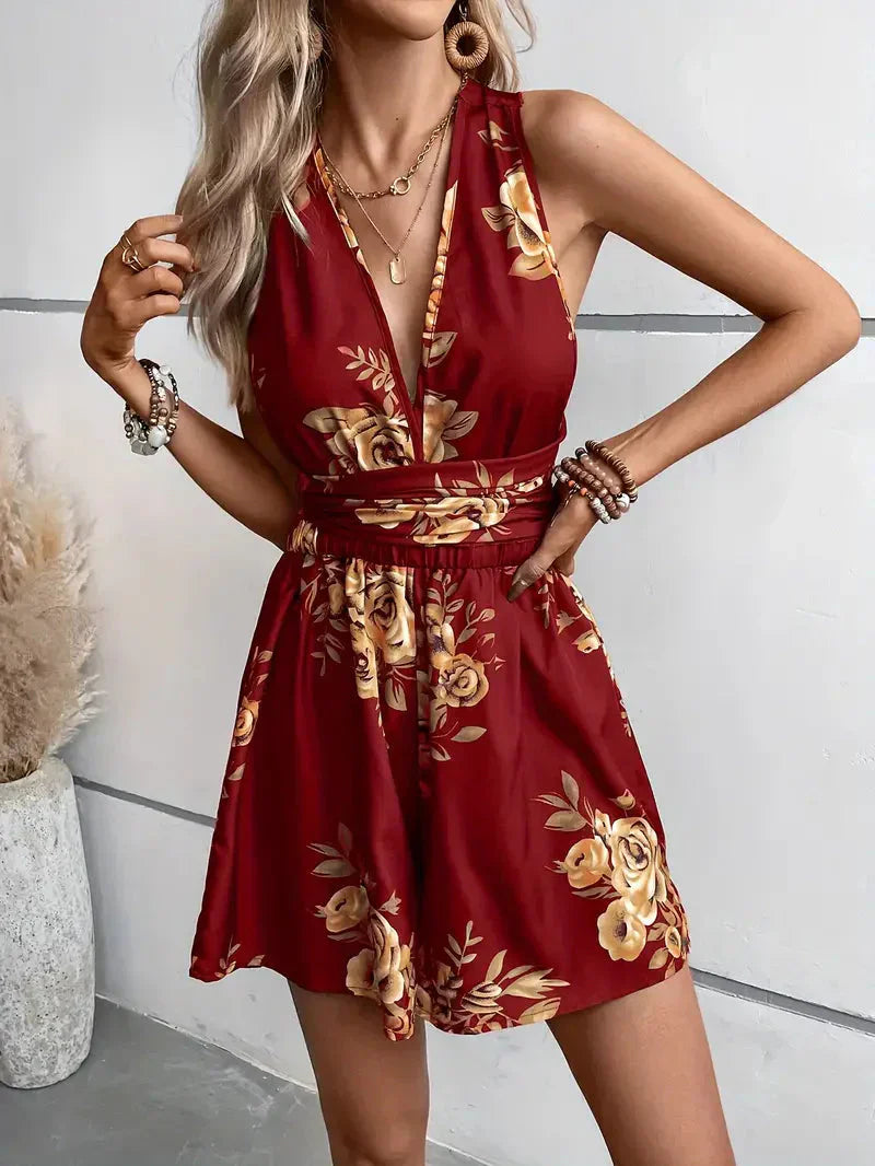 Women's Sleeveless Romper - Deep V-Neck - Ruched Waist - Flowy Hem - Floral Print