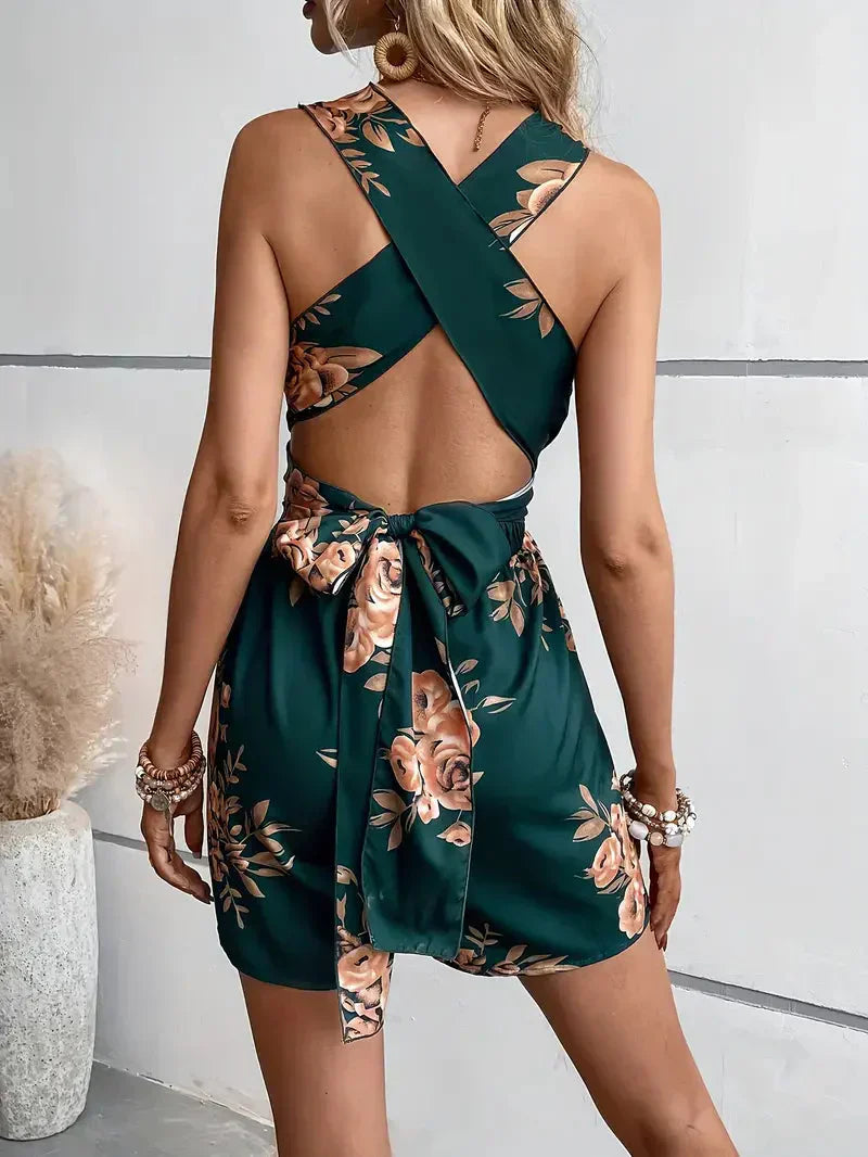 Women's Sleeveless Romper - Deep V-Neck - Ruched Waist - Flowy Hem - Floral Print